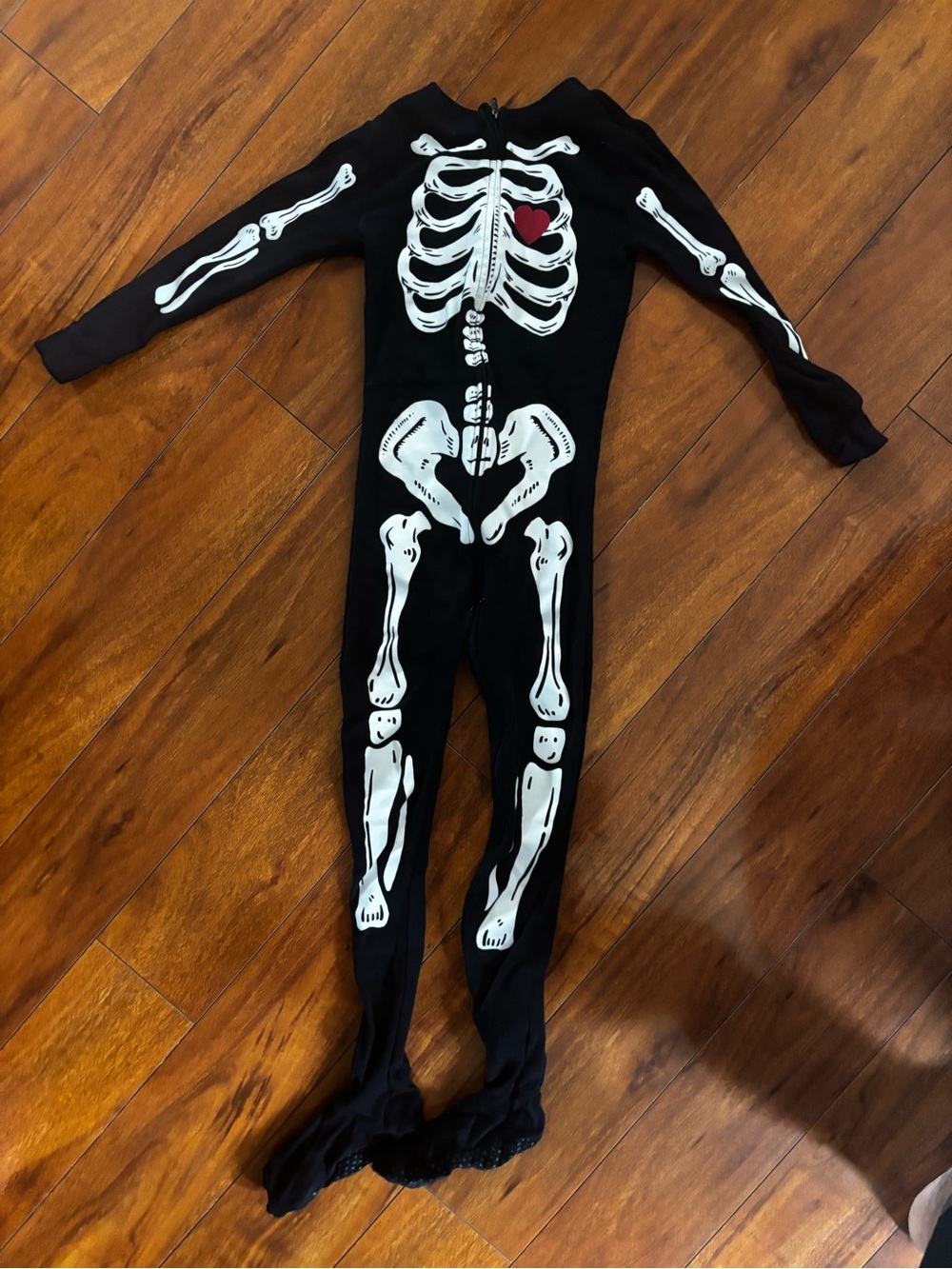 Kids Black Skeleton One-Piece Pajamas with Heart Accent